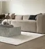 Hoe leg je een vloerkleed bij de bank?