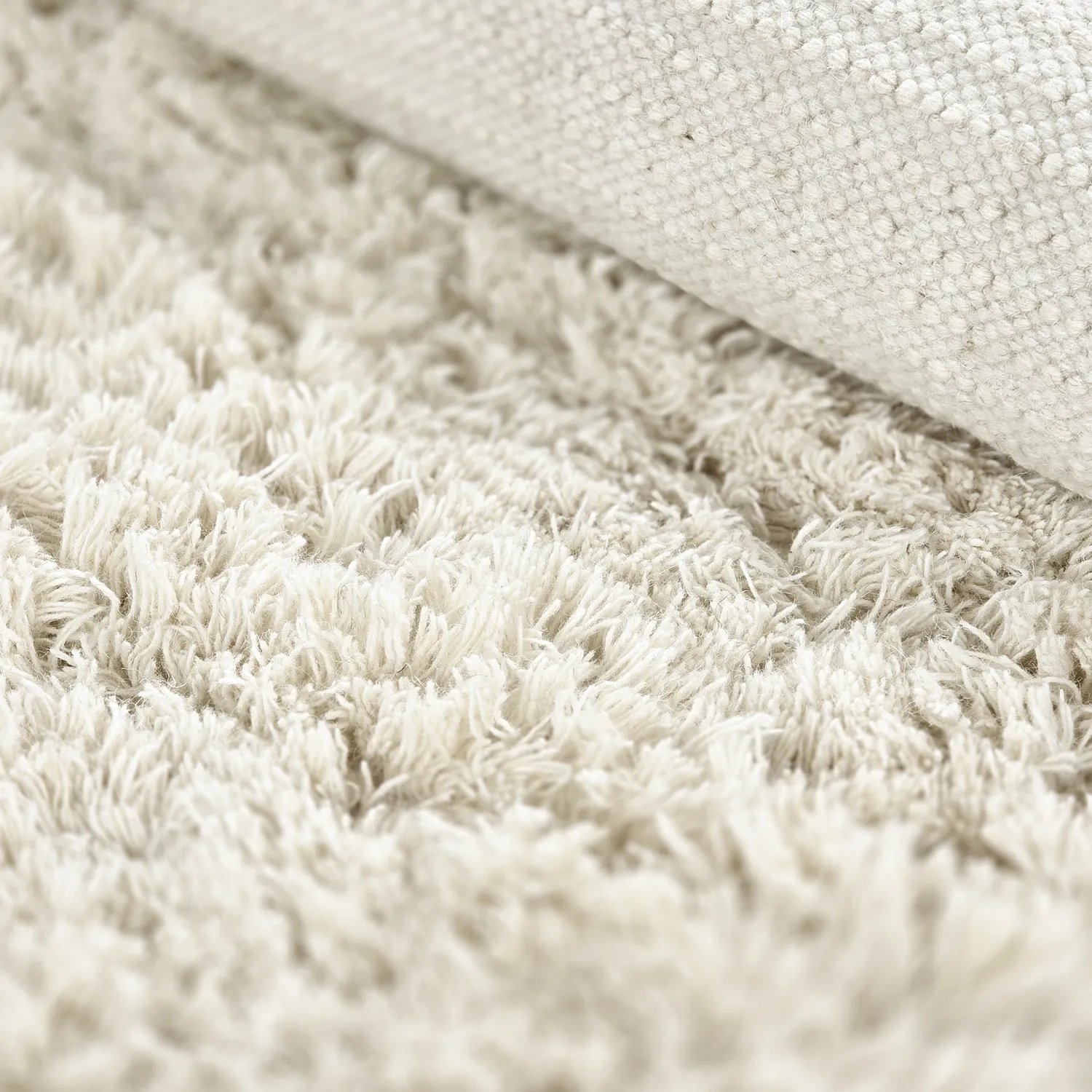Rond vloerkleed - Fassale Hand Woven Wool Shaggy (wit)