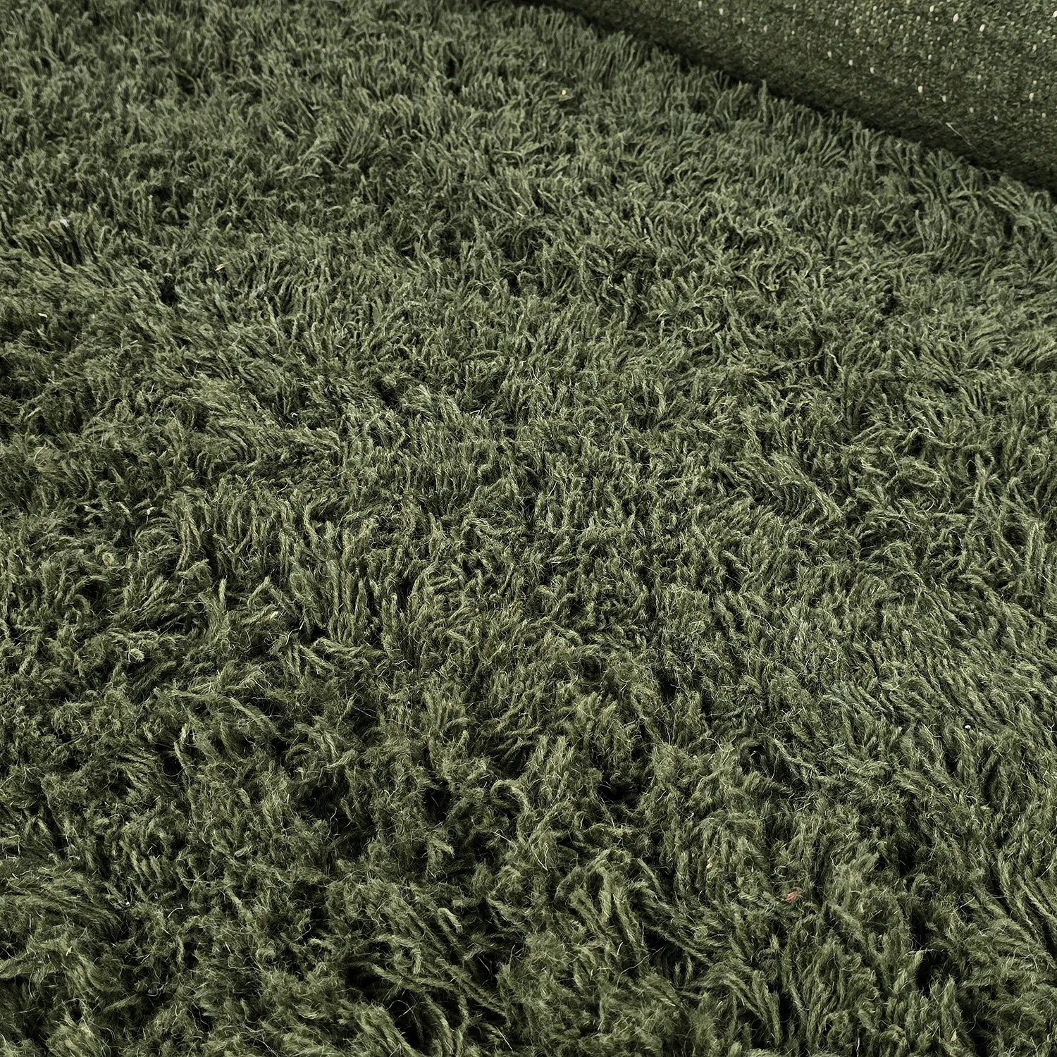 Hoogpolig vloerkleed - Fassale Hand Woven Wool Shaggy (mosgroen)